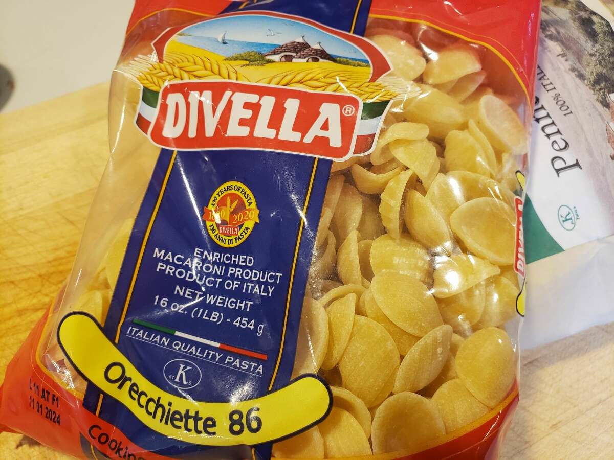 Orecchiette (little ears) pasta like this bag of imported Divella brand is a speciality in Puglia.