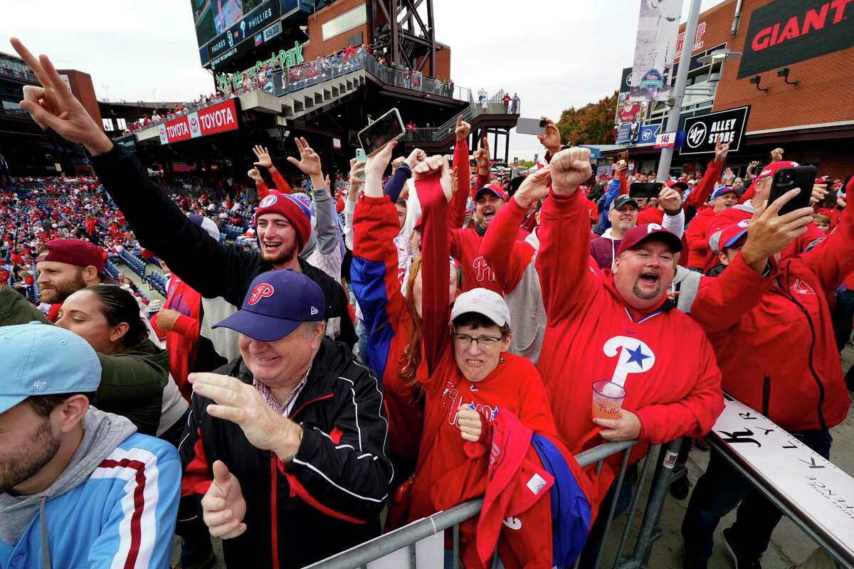Fans cheer before Game 5 of the baseball NL Championship Series between the San Diego Padres and the Philadelphia Phillies on Sunday, Oct. 23, 2022, in Philadelphia. (AP Photo/Matt Rourke)
