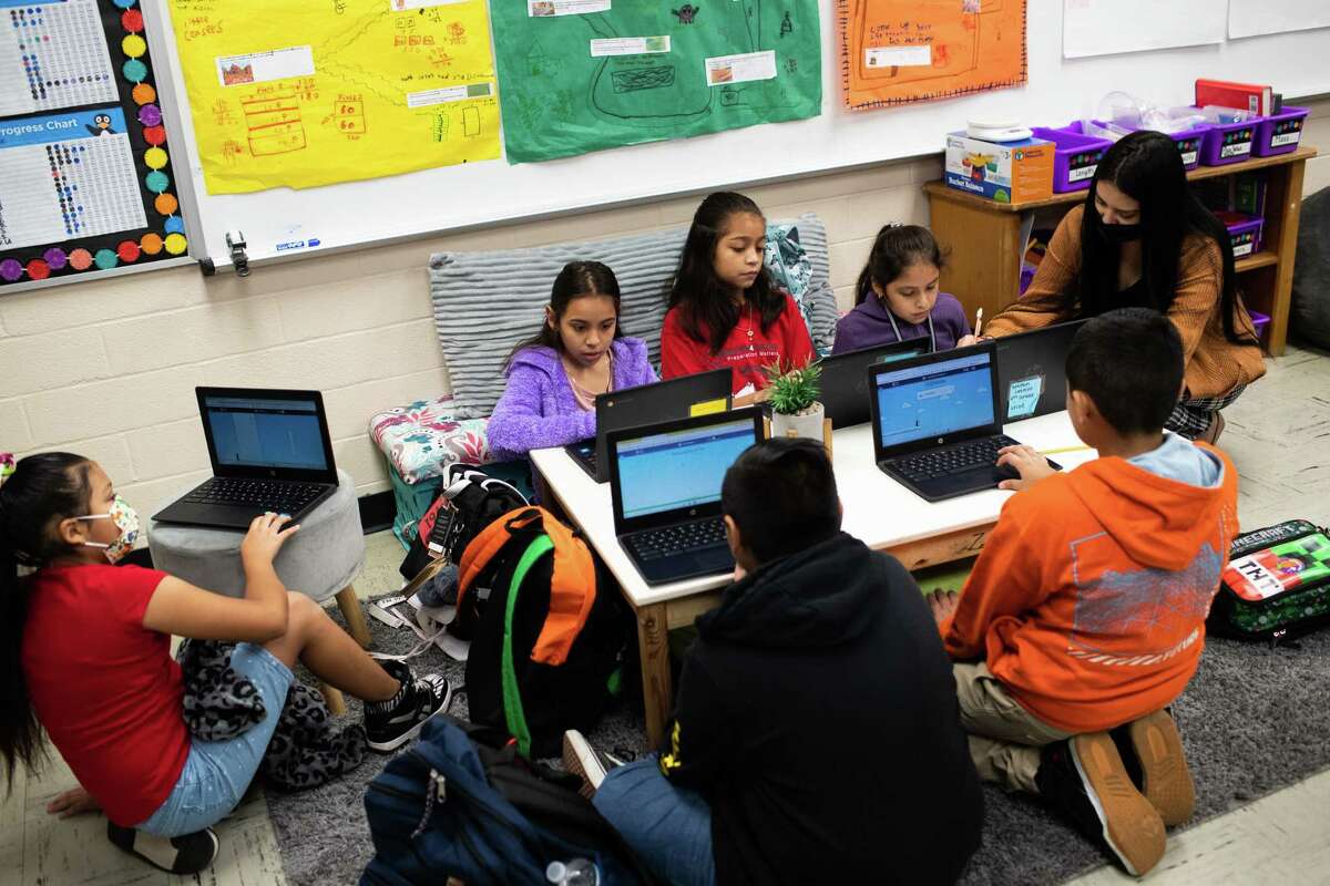 Goodman Elementary fourth grade math students work on assignments in an area saved for alternative seating, Monday, Oct. 24, 2022, in Alief.