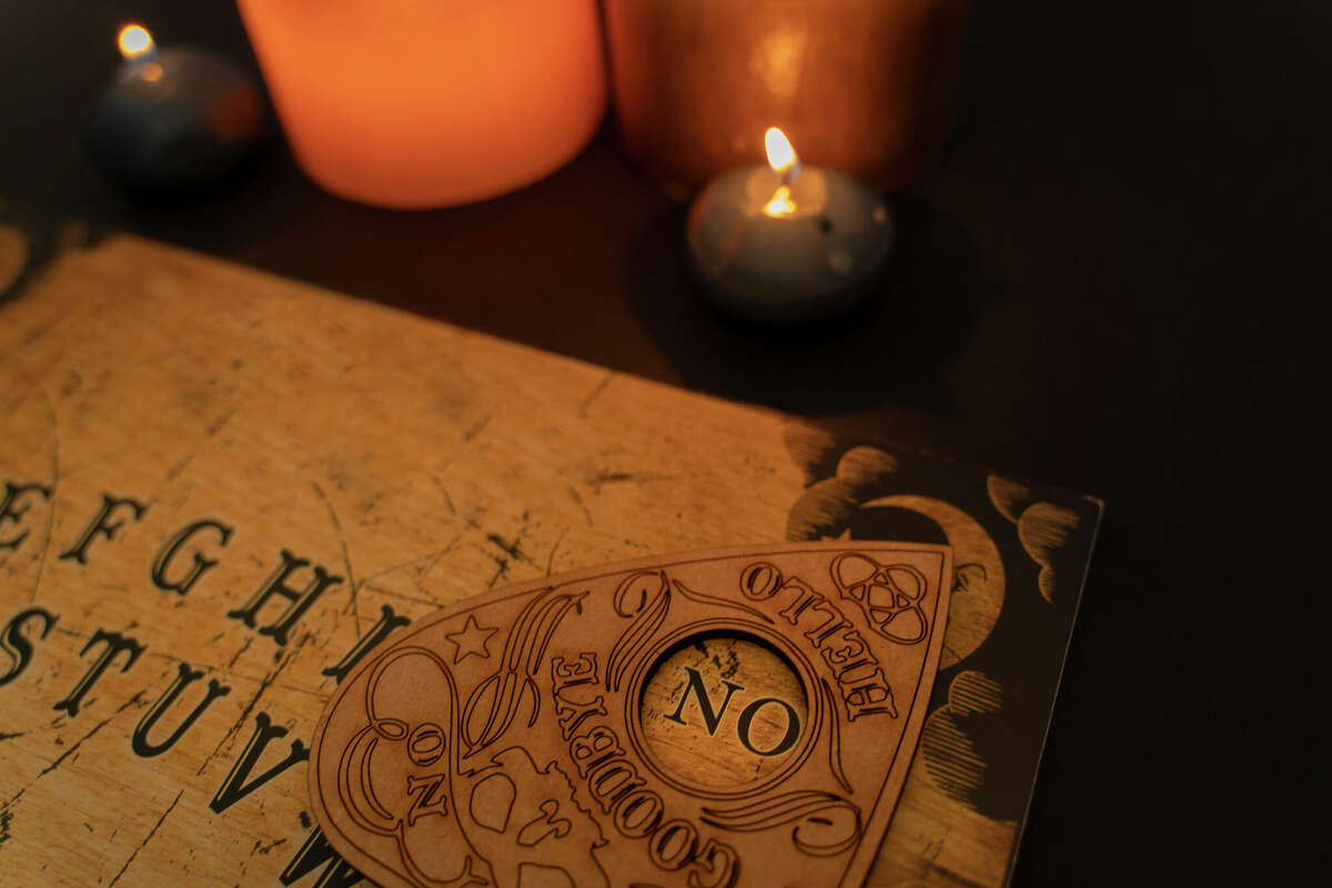 The file photo above shows an example of an Ouija board, similar to the one described in the story.
