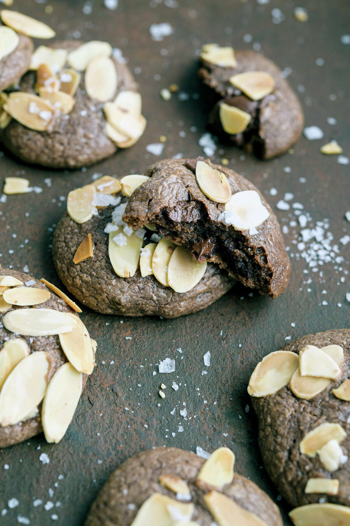 Triple Chocolate Almond Cookies benefit from the use of almond butter in the dough.