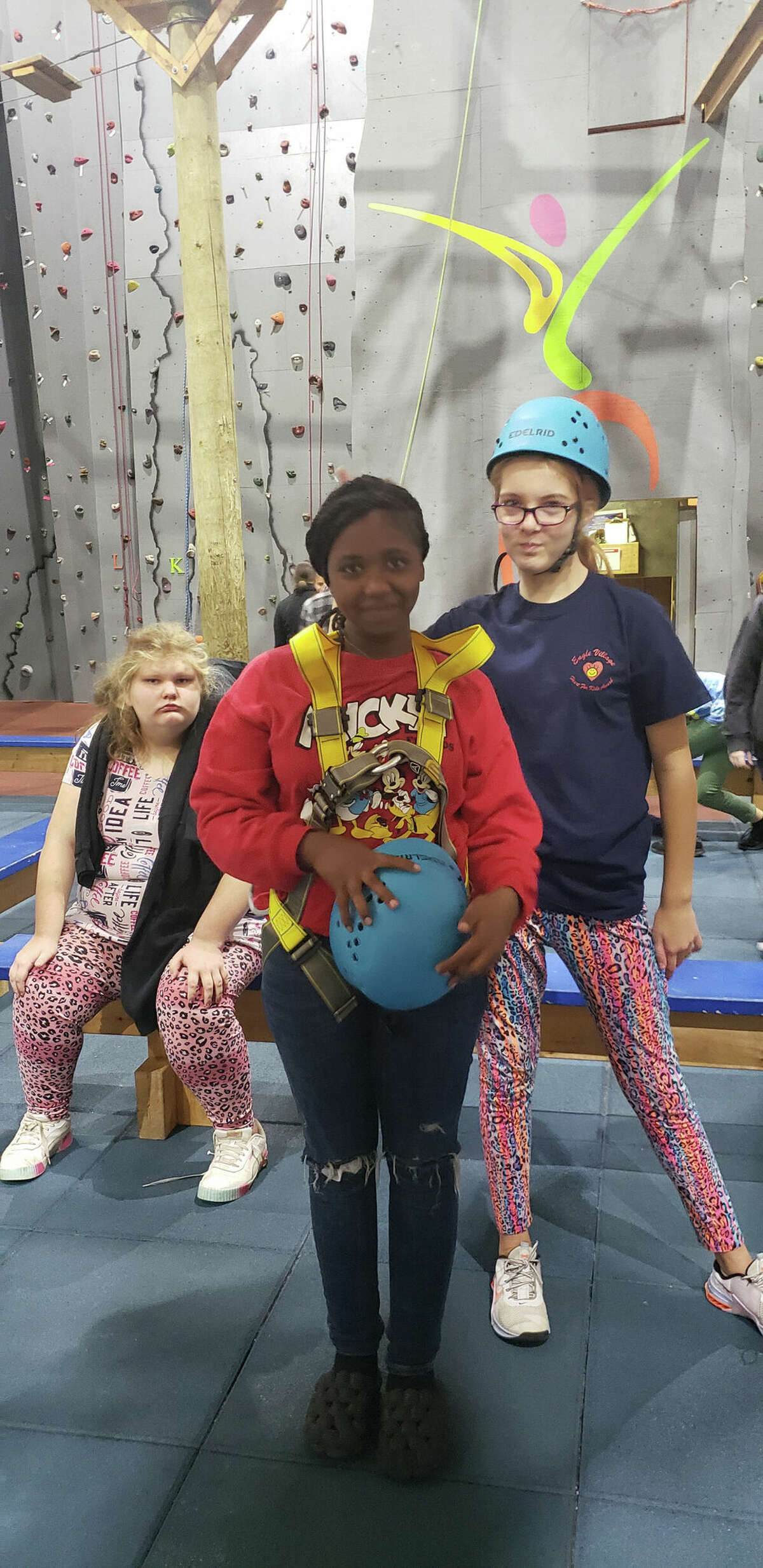 Baldwin students at the rock-climbing wall during their field trip to Eagle Village in Hersey.