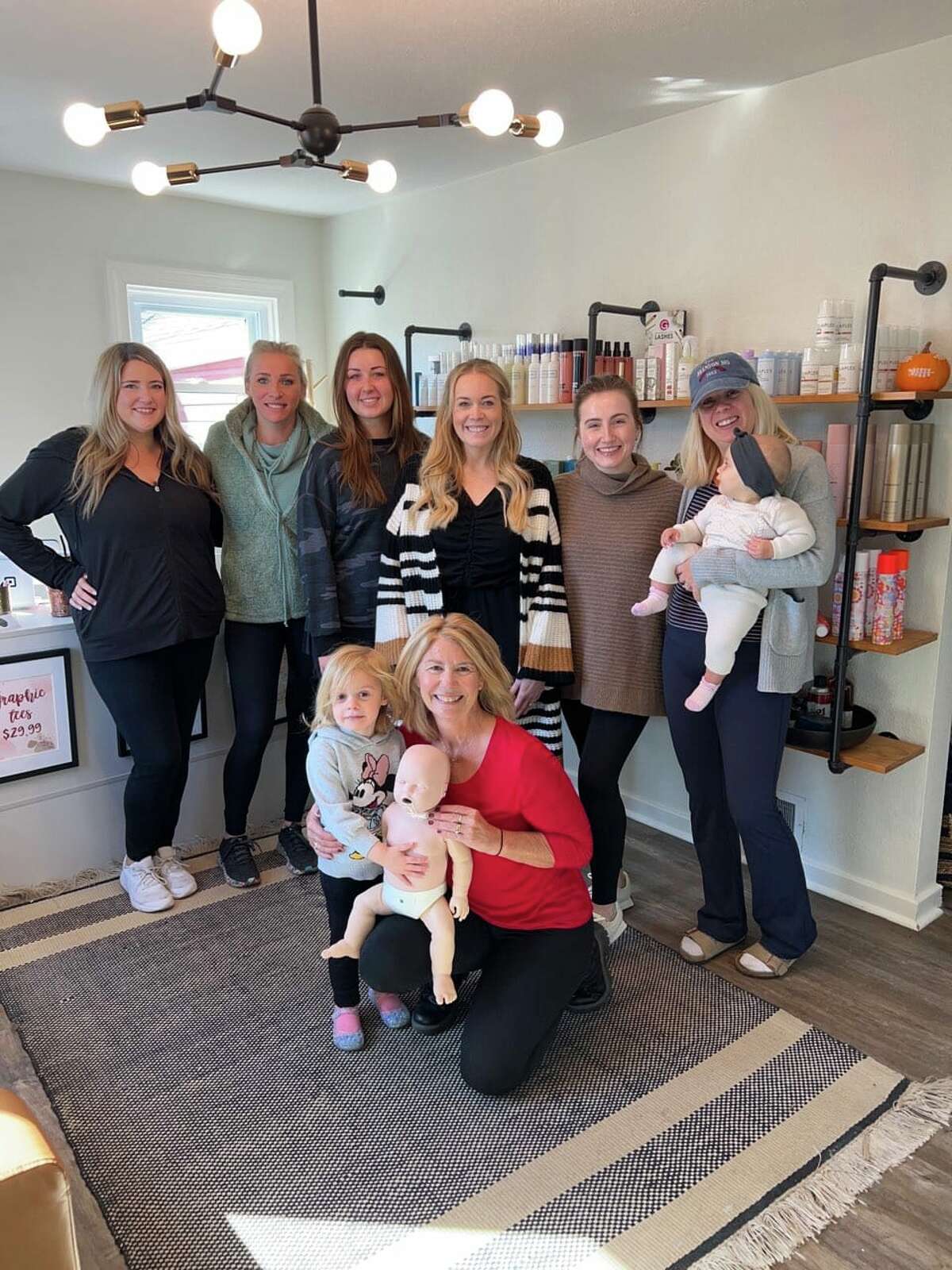 Susie Sweetman, front right, of Alton, known for her personal training, during her newly established CPR classes with the group Brush Hair and Make up, who she taught CPR, including that for infants and toddlers. Sweetman has started teaching CPR, which is good to know for all ages, all people, because it could save a life. 
