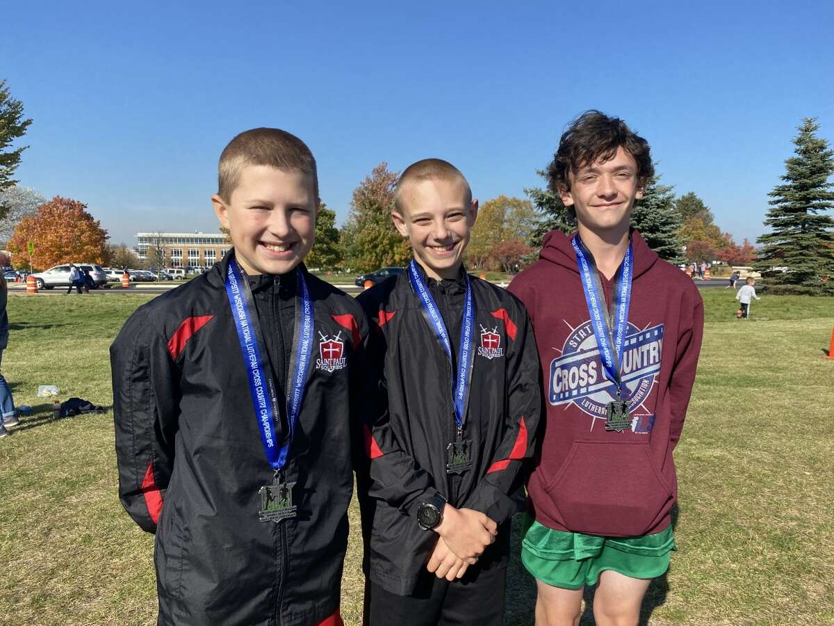 Elijah Ball, Henry Reiseck, Lucas Abbot with their All American medals.