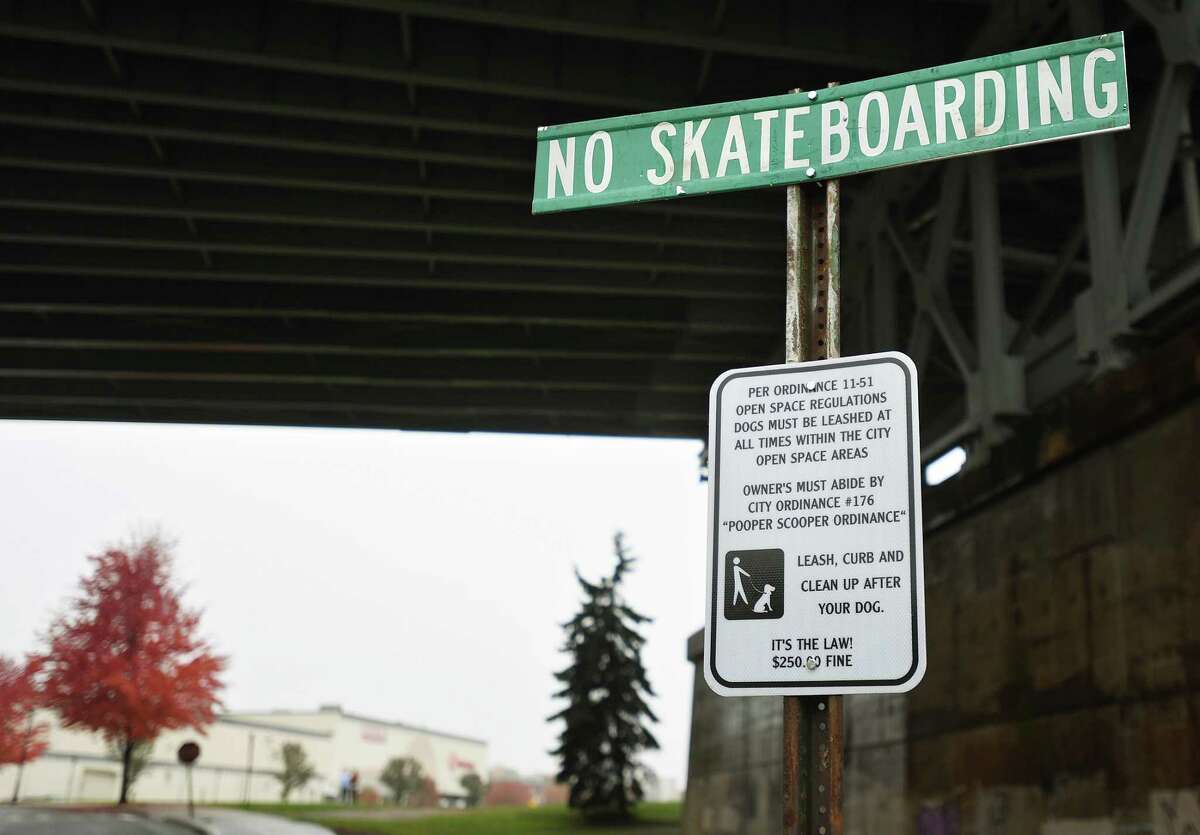 A no skateboarding sign at one end of The Riverwalk in Veterans Memorial Park in Shelton, Conn. on Tuesday, October 25, 2022.