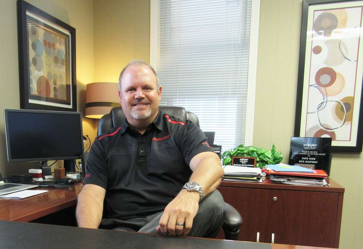State Farm Insurance agent Rick Marteeny at his office in Edwardsville. Marteeny, who has worked for State Farm for 35 years, is a supporter of Edwardsville High School athletics and is involved with many local organizations.
