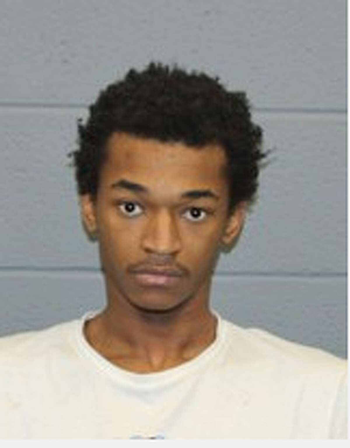 Ervin Barr, 21, of Waterbury, was found in a stolen Audi SUV Monday afternoon after an older woman reported her purse was snatched in a Walmart parking lot, according to Waterbury police.