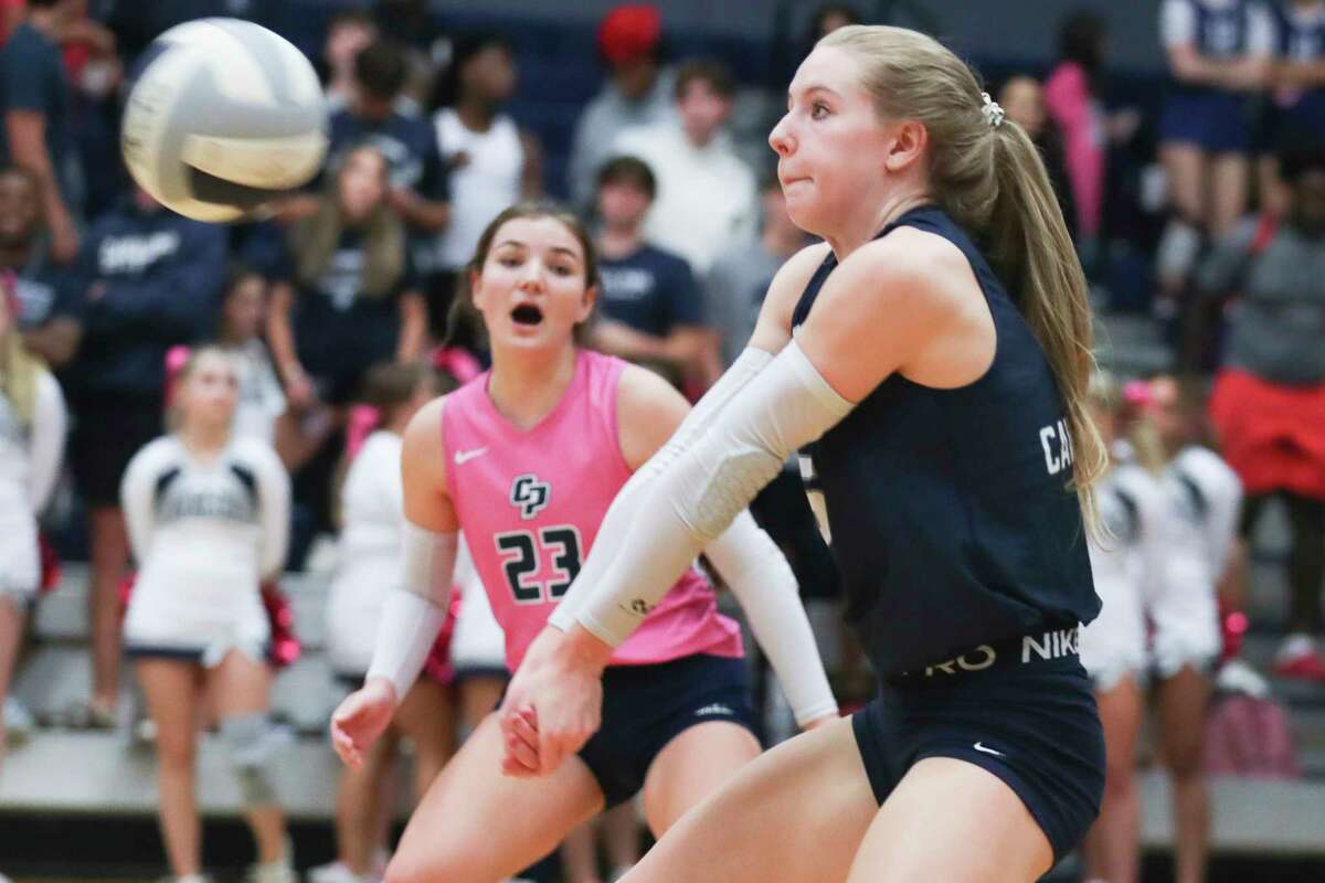 College Park’s Mallory Madison (6) returns a serve in the first set of a District 13-6A high school volleyball match at College Park High School, Tuesday, Oct. 25, 2022, in The Woodlands.