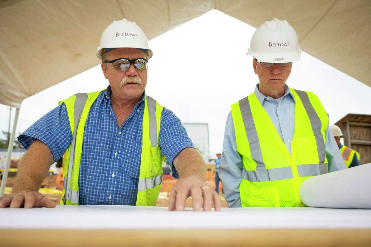Bellows superintendent Kim Salisbury and St. Luke’s United Methodist Church Gethsemane pastor, the Rev Tom Pace, go over blueprints on the construction site of a new community center on Monday, Oct. 17, 2022. The center is being built by St. Luke’s United Methodist Church and will house four nonprofit community organizations and a community health care clinic.