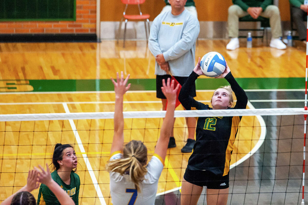 The Dow and Midland high-level volleyball teams face off in a rivalry matchup Oct. 25 at Dow High School.