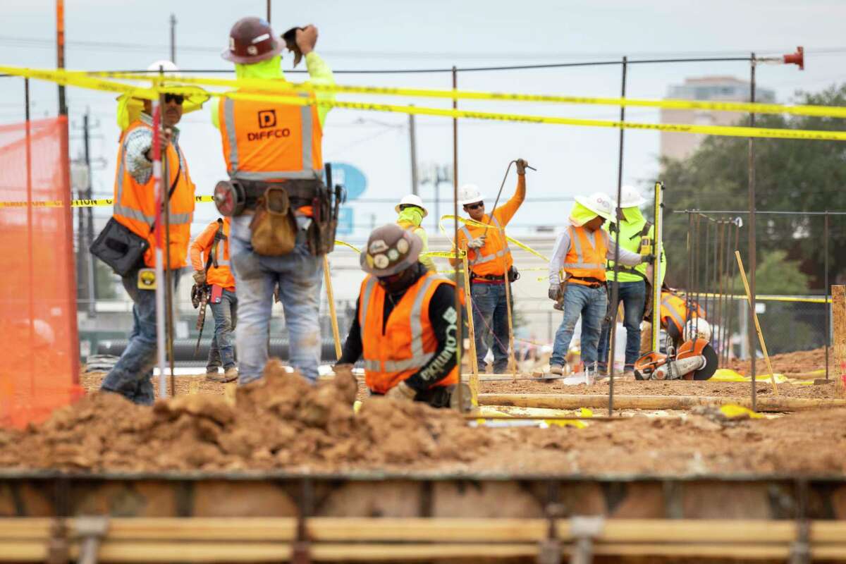 Workers build a new community center on the St. Luke’s United Methodist Church Gethsemane campus, which will house four nonprofit community organizations and a community health care clinic.