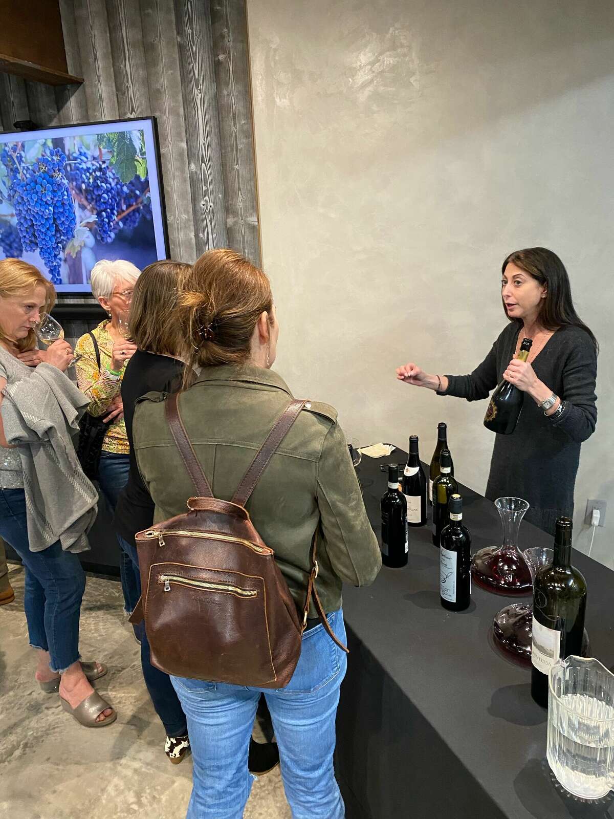 At a grand opening of the brand-new wine storage vault, local liquor retailers and suppliers provided beverage tastings to guests.