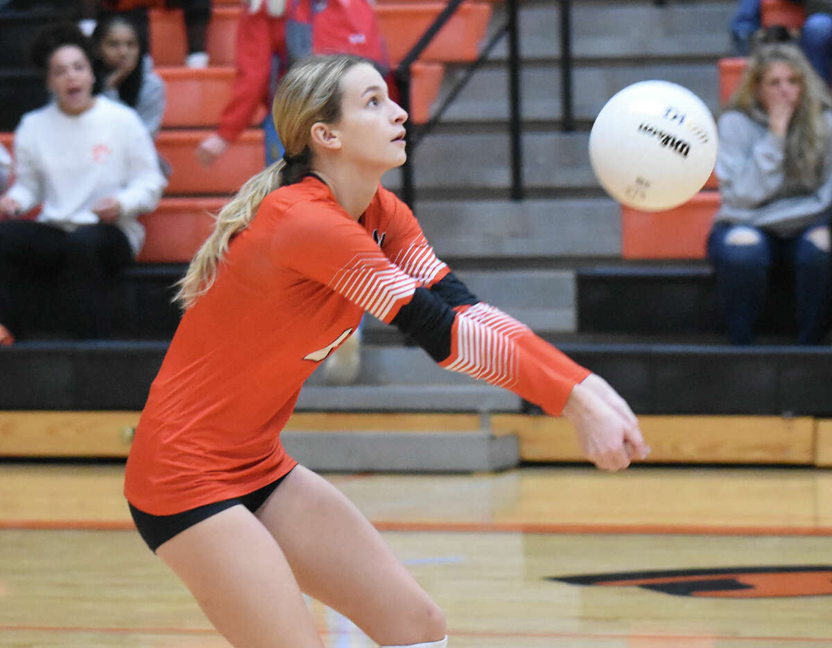 Edwardsville's Vyla Hupp receives a serve against Granite City during the first set of the Class 4A Edwardsville Regional semifinals on Tuesday in Edwardsville.