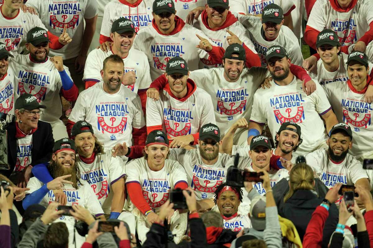 Philadelphia Phillies celebrate after winning the baseball NL Championship Series in Game 5 against the San Diego Padres on Sunday, Oct. 23, 2022, in Philadelphia.