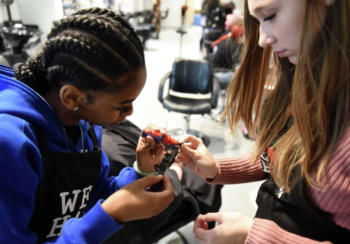 Albany High students making free wigs for cancer patients