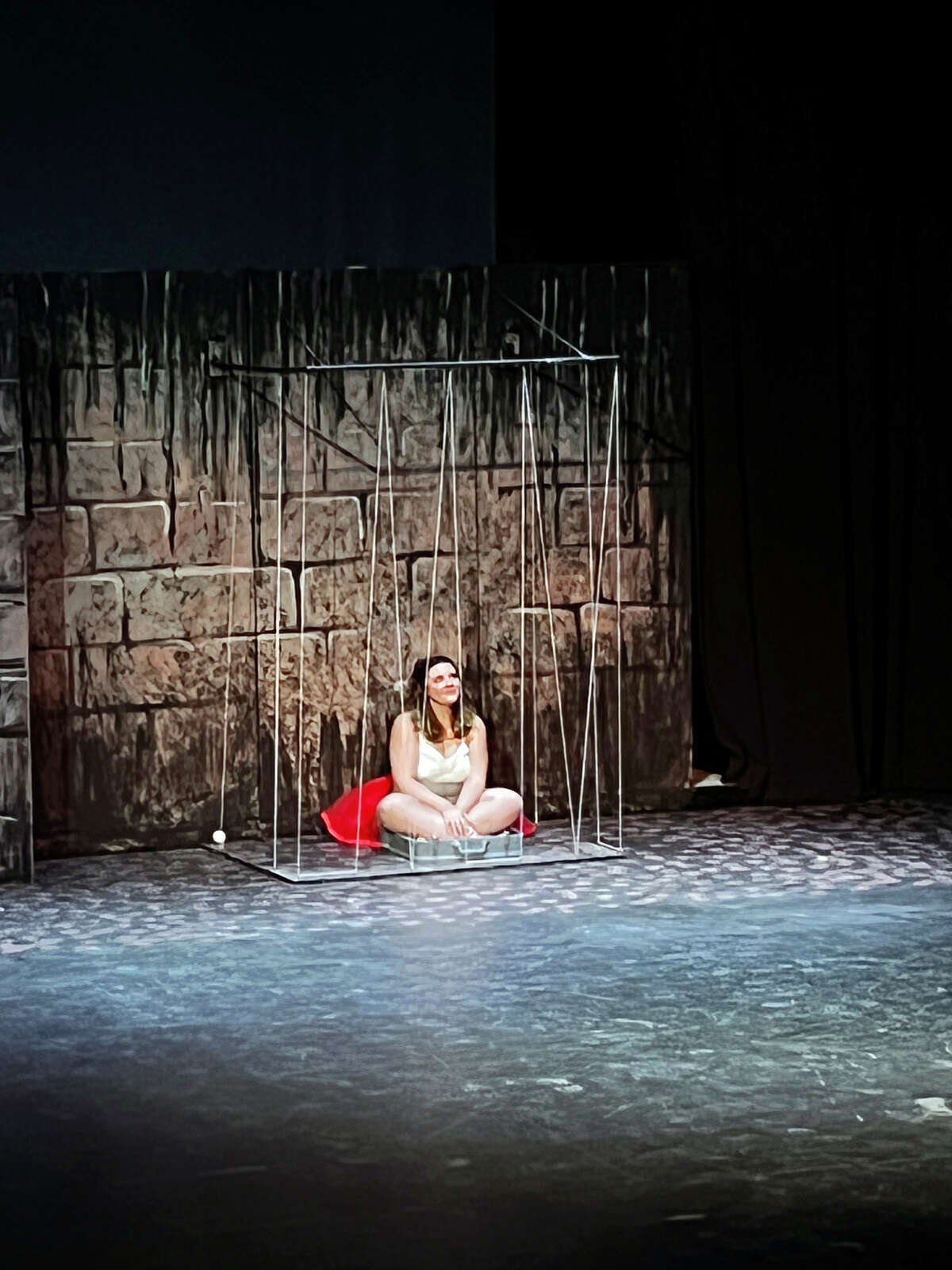 Illinois College senior Cassidy Harvey portrays the title character during rehearsals for IC TheatreWorks' production of "Eurydice." The play follows the story of young lovers Eurydice and Orpheus, the latter of whom ventures into the Underworld to reclaim his bride-to-be after she dies on their wedding day.