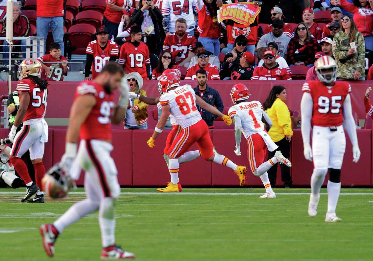 Travis Kelce (87) and Jerick McKinnon (1) celebrate after McKinnon’s fourth quarter run put the Chiefs at the 4 yard line as the San Francisco 49ers played the Kansas City Chiefs at Levi’s Stadium in Santa Clara, Calif., on Sunday, October 23, 2022. The 49ers lost 44-23 to the Chiefs.