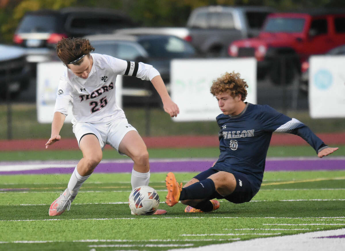 Edwardsville's Sam Reader eludes a slide tackle against O'Fallon in the first half of the Class 3A Moline Sectional semifinals on Wednesday at Collinsville High School.