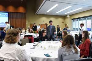 Students learn about state government during mock legislative committee hearing