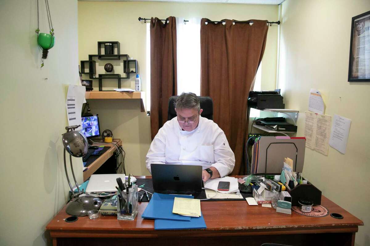 Geoffrey Deetz works in his office at Le Colonial. He joined the restaurant as executive chef late last year.