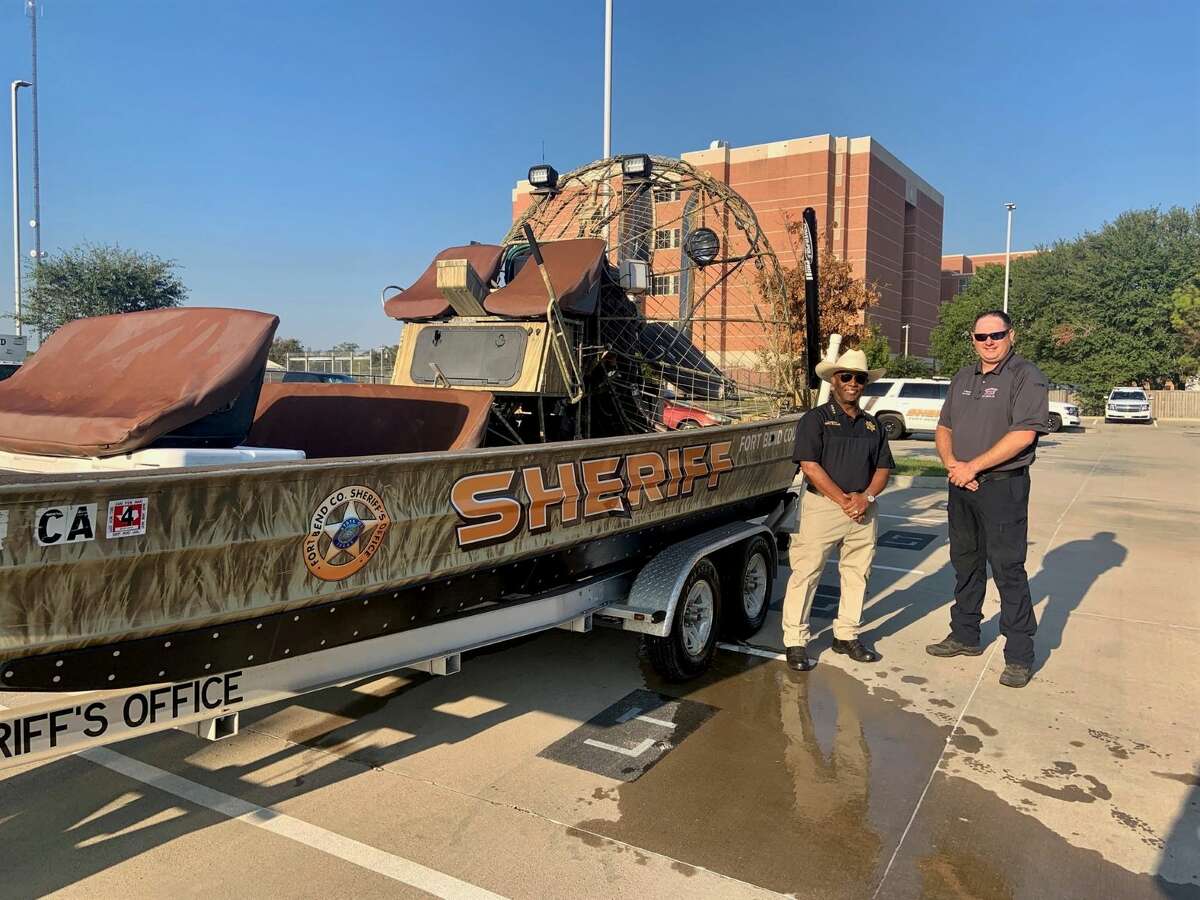 Fort Bend County Sheriff Eric Fagan and Northeast Fort Bend County Fire Department Fire Chief Travis Baxter say equipment such as the sheriff's department's airboat will help a new regional dive and water-rescue team respond quickly to emergencies.