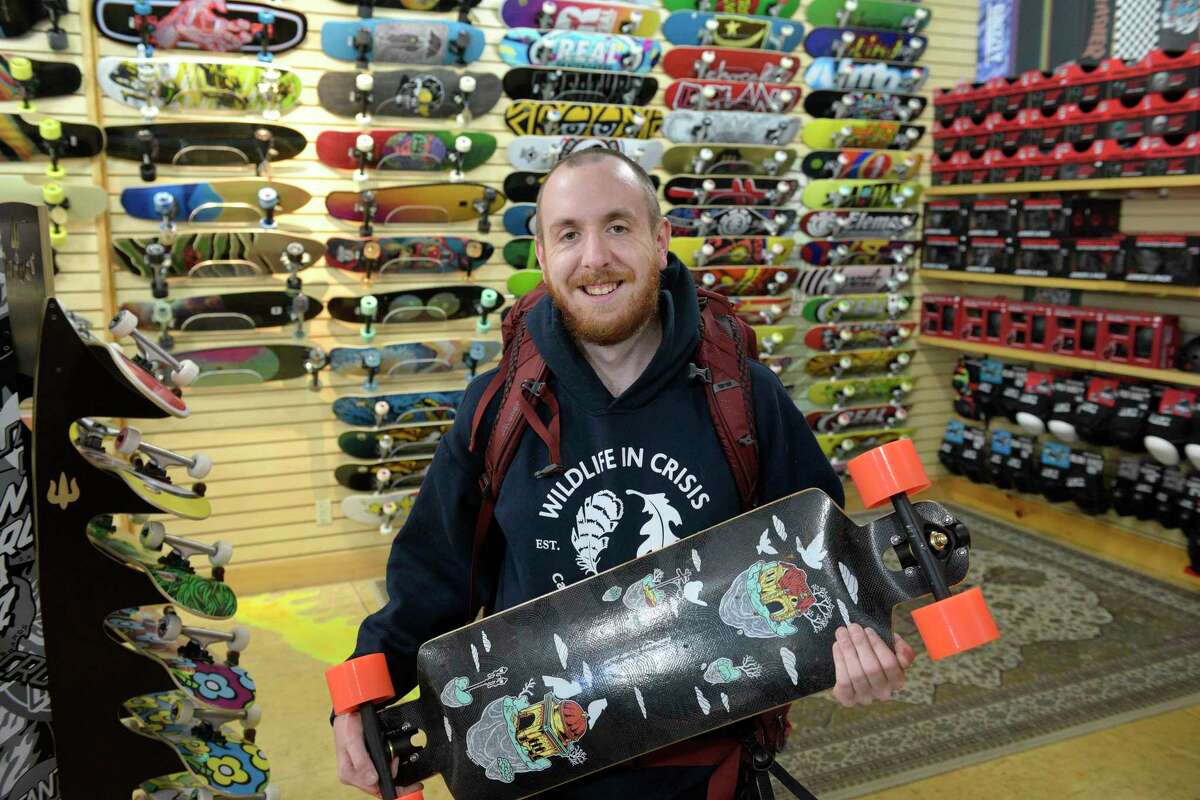 Geoffrey Saunders, of Norwalk, is going to skateboard across New Zealand to raise money for a Weston animal sanctuary. One of his sponsors is Utopia Skate Shop in Norwalk. Thursday, October 27, 2022, Norwalk, Conn.