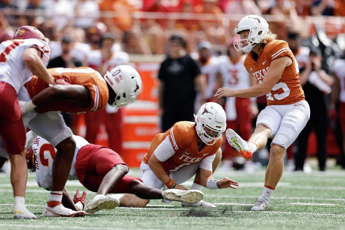 AUSTIN, TEXAS - OCTOBER 15: Bert Auburn #45 of the Texas Longhorns kicks a field goal in the second half against the Iowa State Cyclones at Darrell K Royal-Texas Memorial Stadium on October 15, 2022 in Austin, Texas. (Photo by Tim Warner/Getty Images)