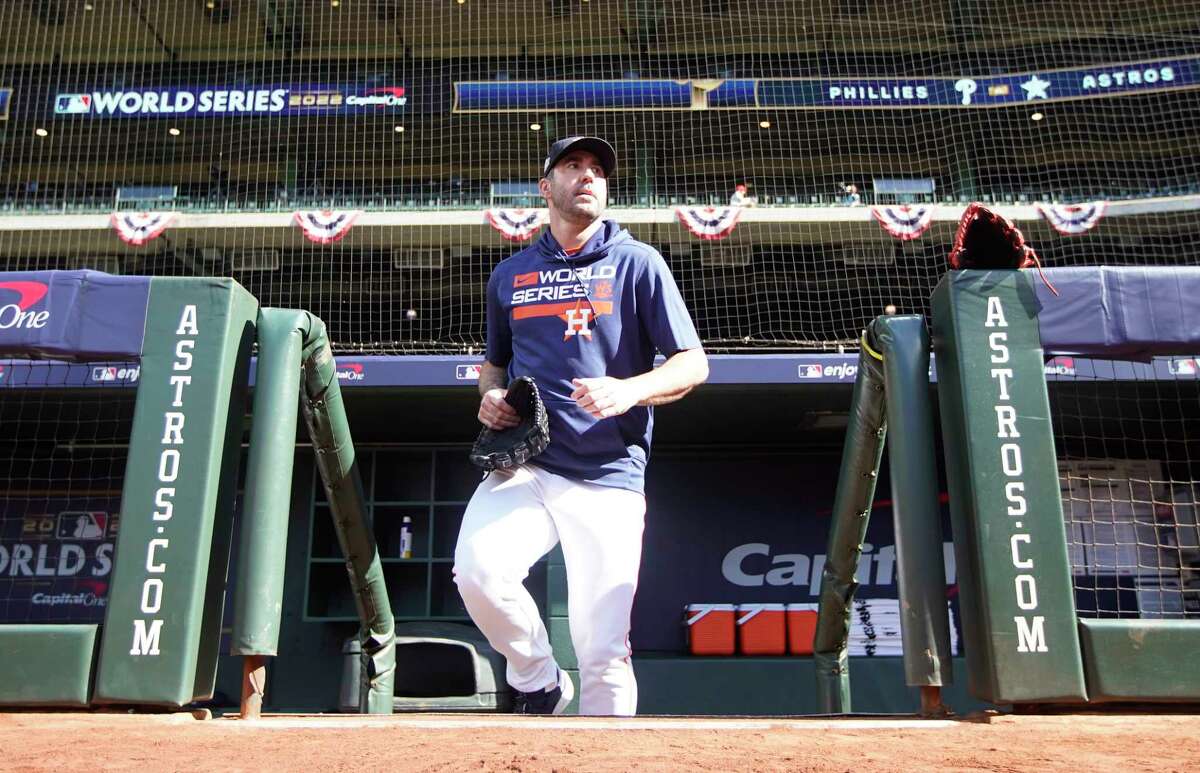 Houston Astros starting pitcher Justin Verlander comes out of the dugout to workout ahead of Game 1 of baseball’s World Series at Minute Maid Park on Thursday, Oct. 27, 2022 in Houston.
