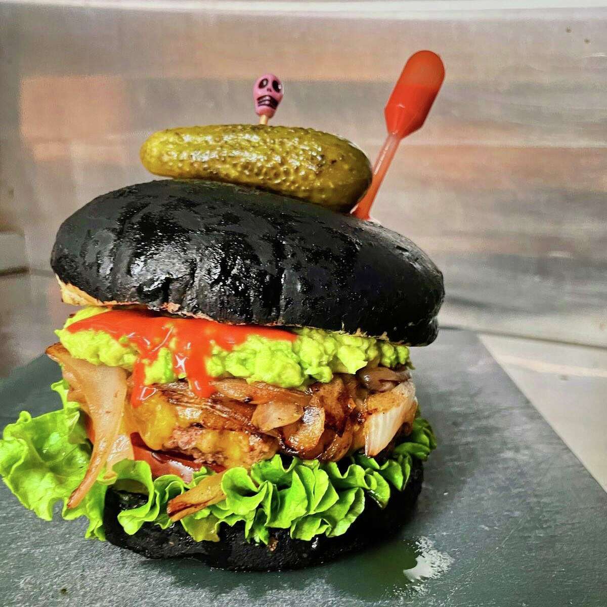 This photo from Nomada Food Truck's Faceboook shows the Halloween burger the truck will be selling on October 30.