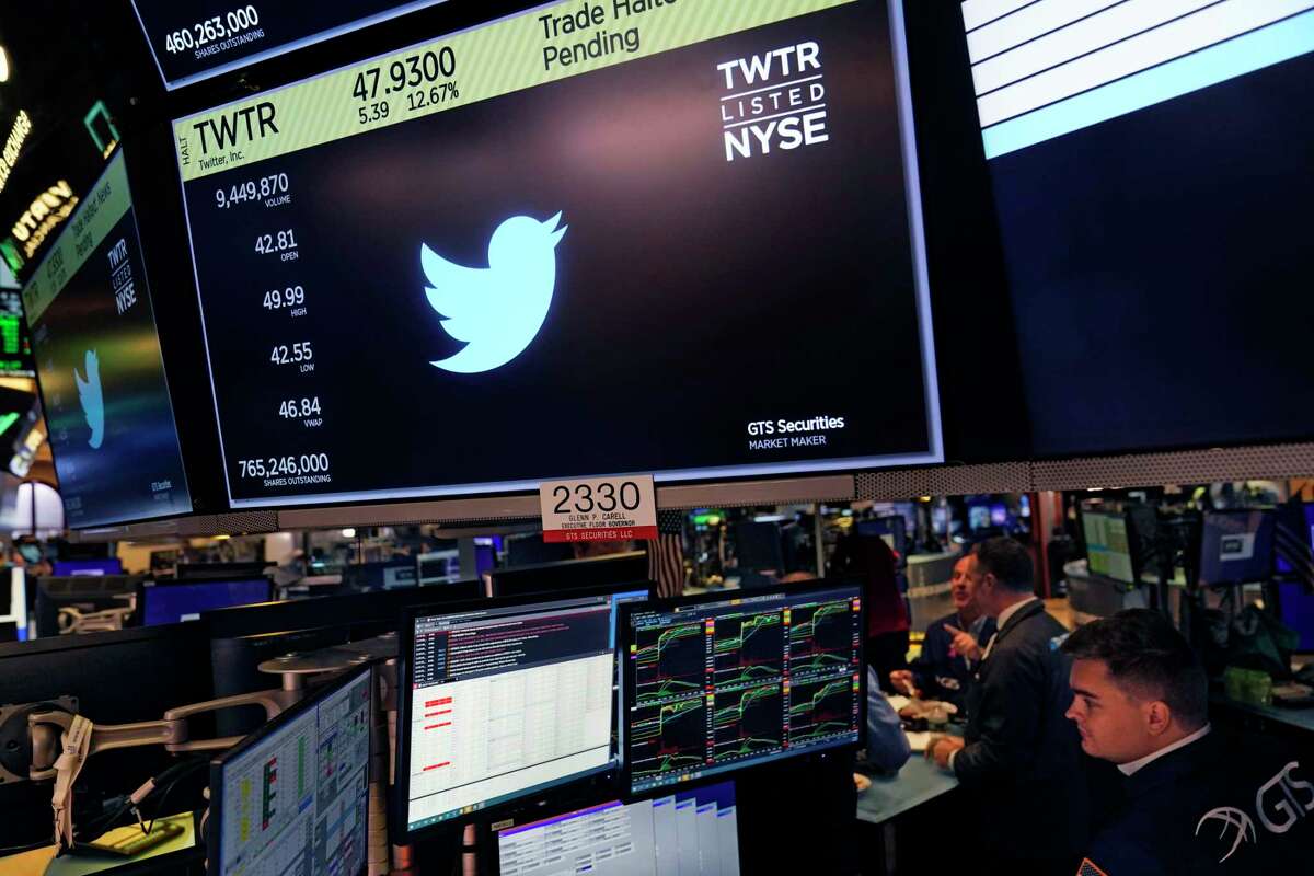 The symbol for Twitter appears above a trading post on the floor of the New York Stock Exchange, Tuesday, Oct. 4, 2022.