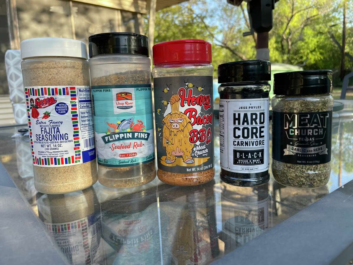 An assortment of recommended spices include (from left): Fiesta brand fajita seasoning, Flippin Fins seafood rub, Honey Bacon BBQ rub, Hardcore Carnivore Black rub, and the Meat Church garlic and herb rub.