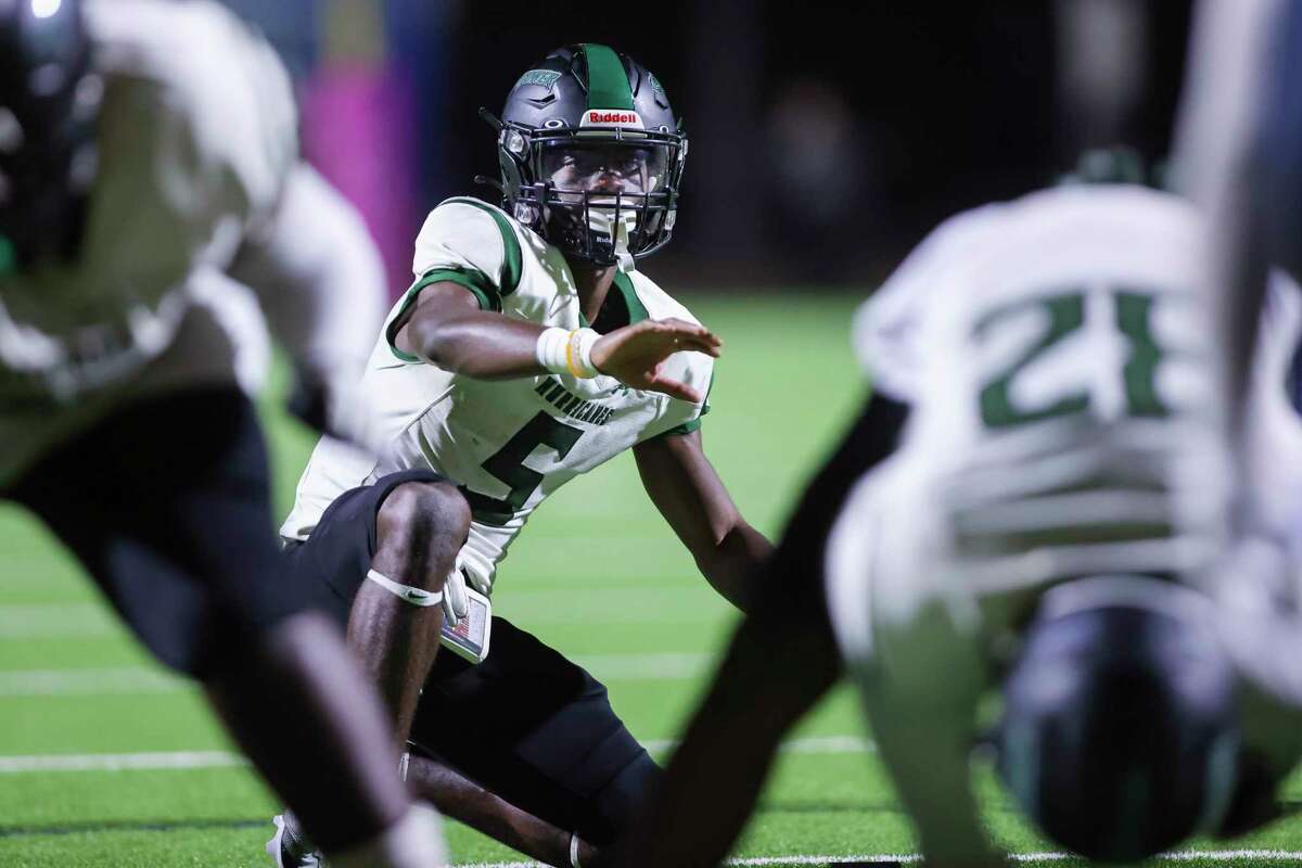 Hightower’s Jalen Davis (5) waits for an extra point snap in the first half of a District 20-6A high school football game between the Hightower Hurricanes and the Clements Rangers at Mercer Stadium in Sugarland, TX on Thursday, October 27, 2022.