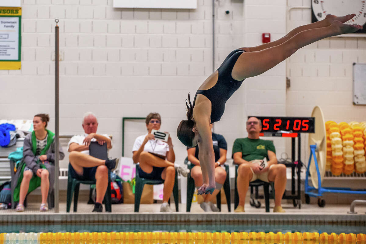 PHOTOS Dow, Midland high schools meet for swimming and diving
