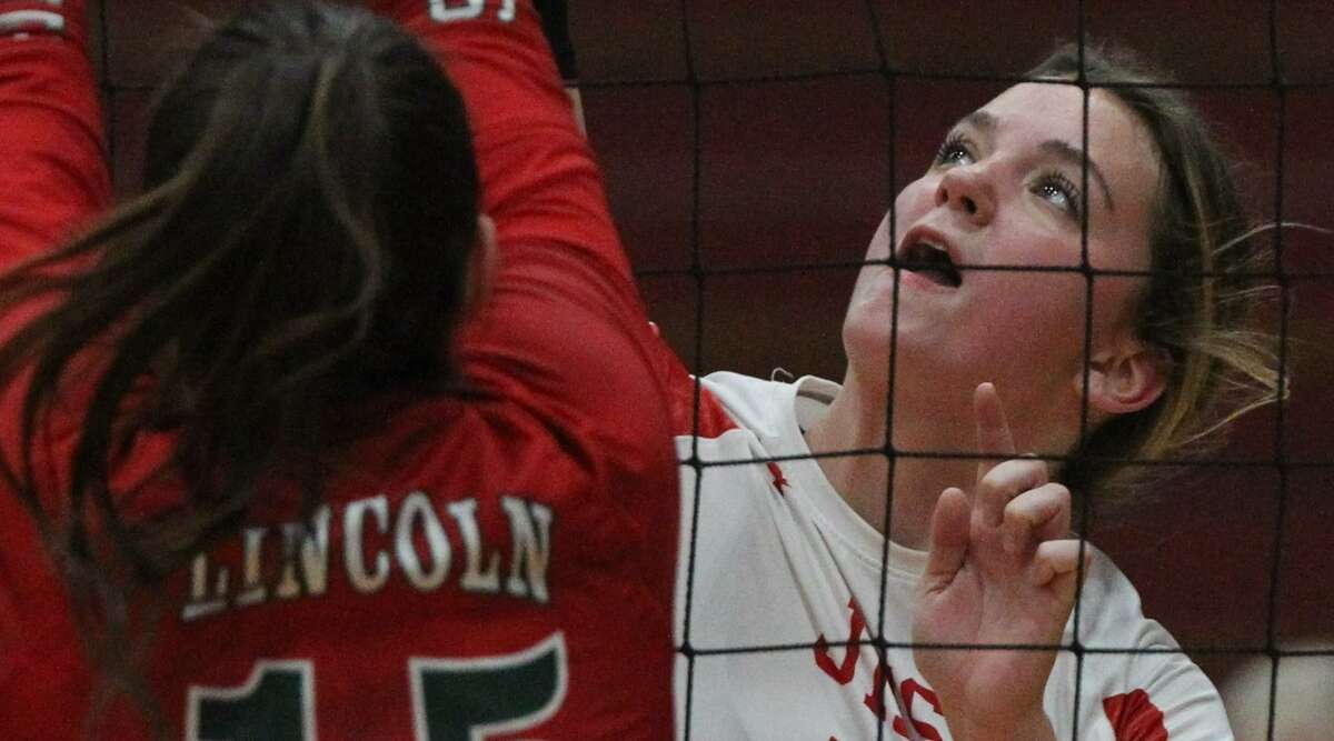Action from the Jacksonville volleyball team's loss to Lincoln in the championship match of the Jacksonville Regional at The JHS Bowl Thursday night