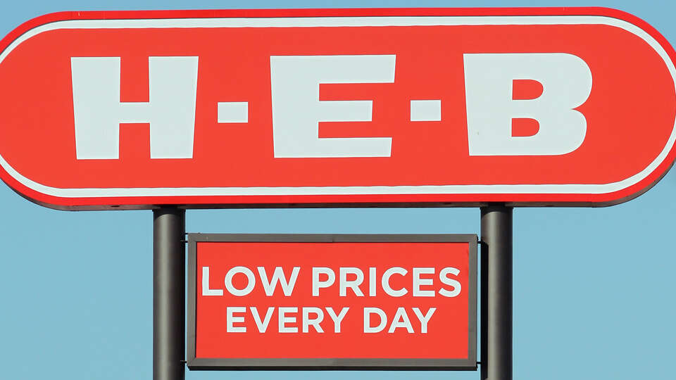 A Target sign (right) is next to an H-E-B sign on Southeast Military Drive near Brooks City-Base.