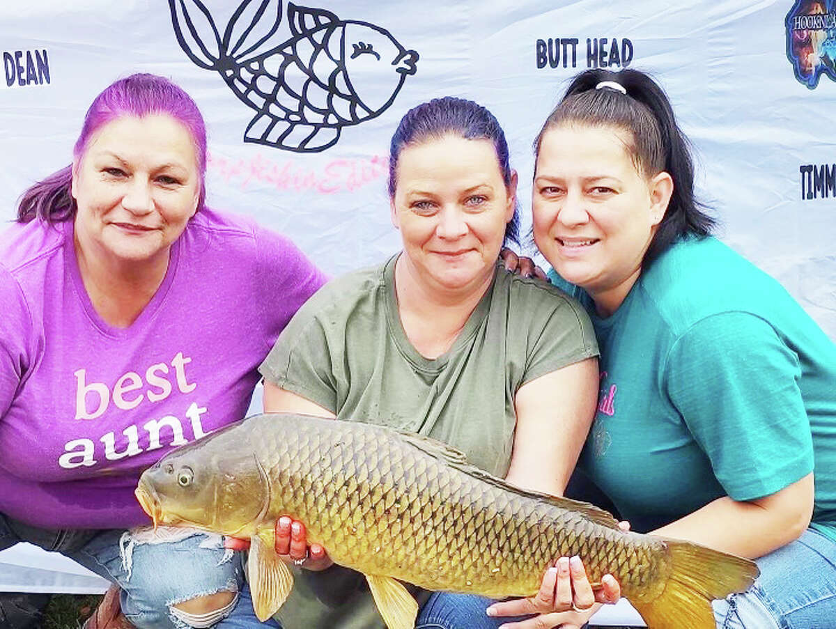 Shown are April Hitchcock, Tammy Ford and Christie Haney, all of Georgia. Anglers came from as far away as Indianapolis and Georgia to vie for the top prize of $12,000 during this weekend’s 2022 Fishin’ Factory 3 Connecticut Carp Open. Situated along the Connecticut River from Enfield to Haddam, these fishers invested thousands in high-quality gear. Anglers have been out since early Wednesday around the clock, taking naps and camping along the banks. The biggest catch by Thursday afternoon weighed 28 lbs. They’re hoping to beat the state record of a carp weighing 43 lbs 12 ounces. 