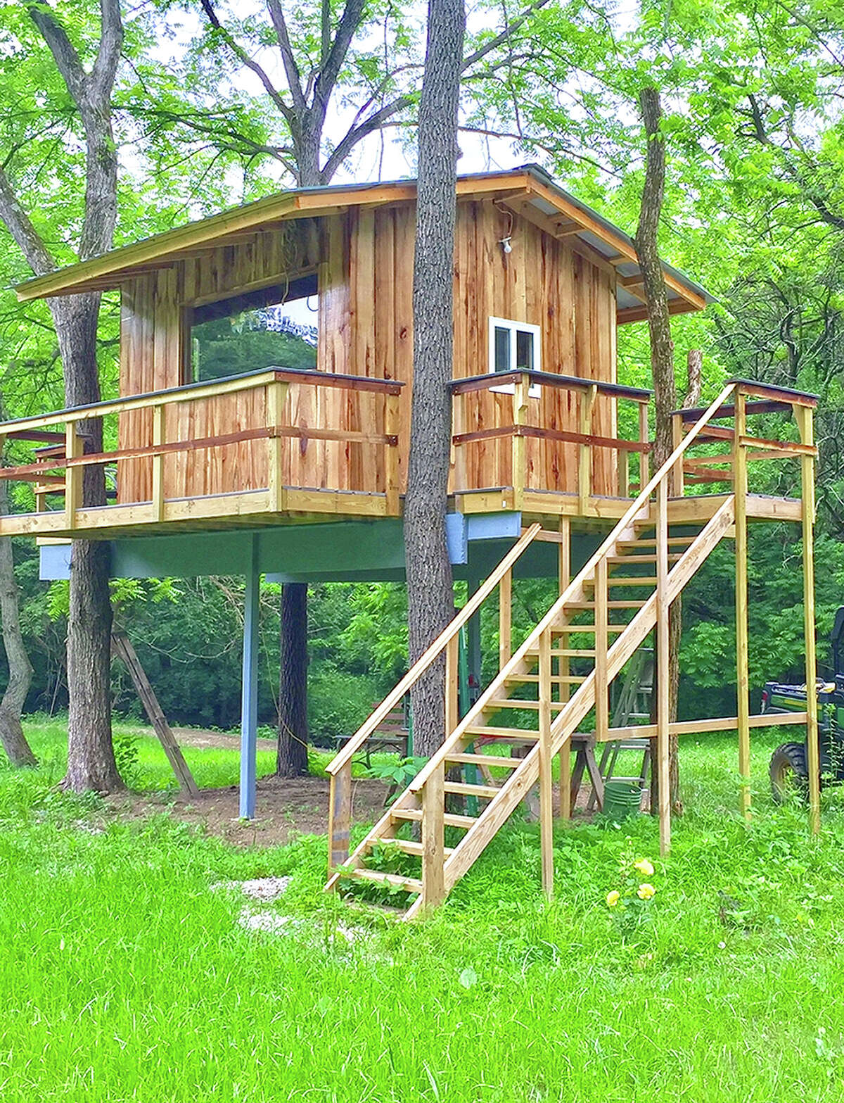 Kathy Caruthers' husband built this treehouse so she can photograph wildlife on their property near Waverly.