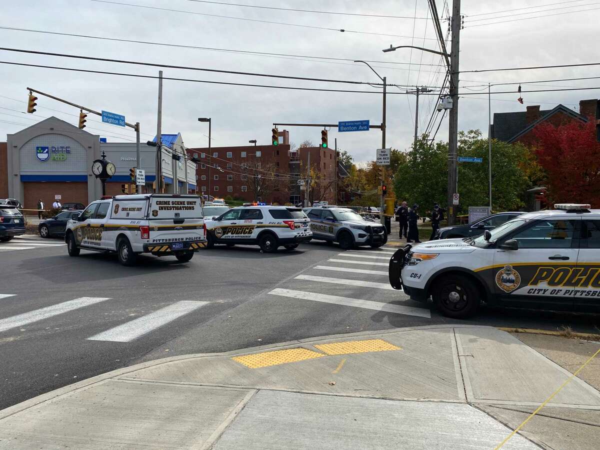 Two teens charged in shooting that injured 6 during funeral service in