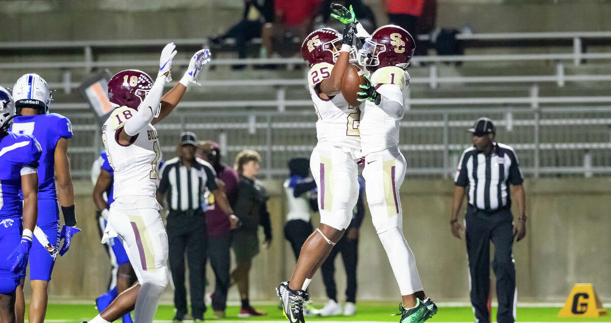 Summer Creek receiver Roriyon Richardson (1) celebrates with Lloyd Avant (25) after catching a touchdown pass pass from Jahrik Jones in a high school football game between Summer Creek and C.E. King Friday, Oct 28, 2022, in Houston.