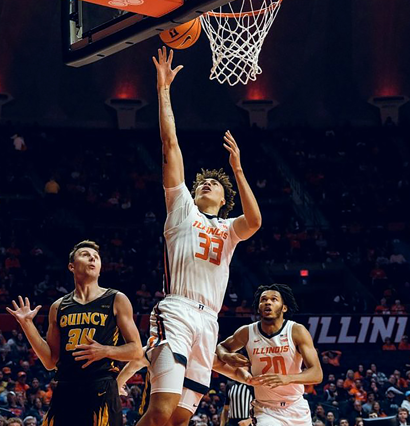 Illini Cagers Roll Past Quincy In Exhibition