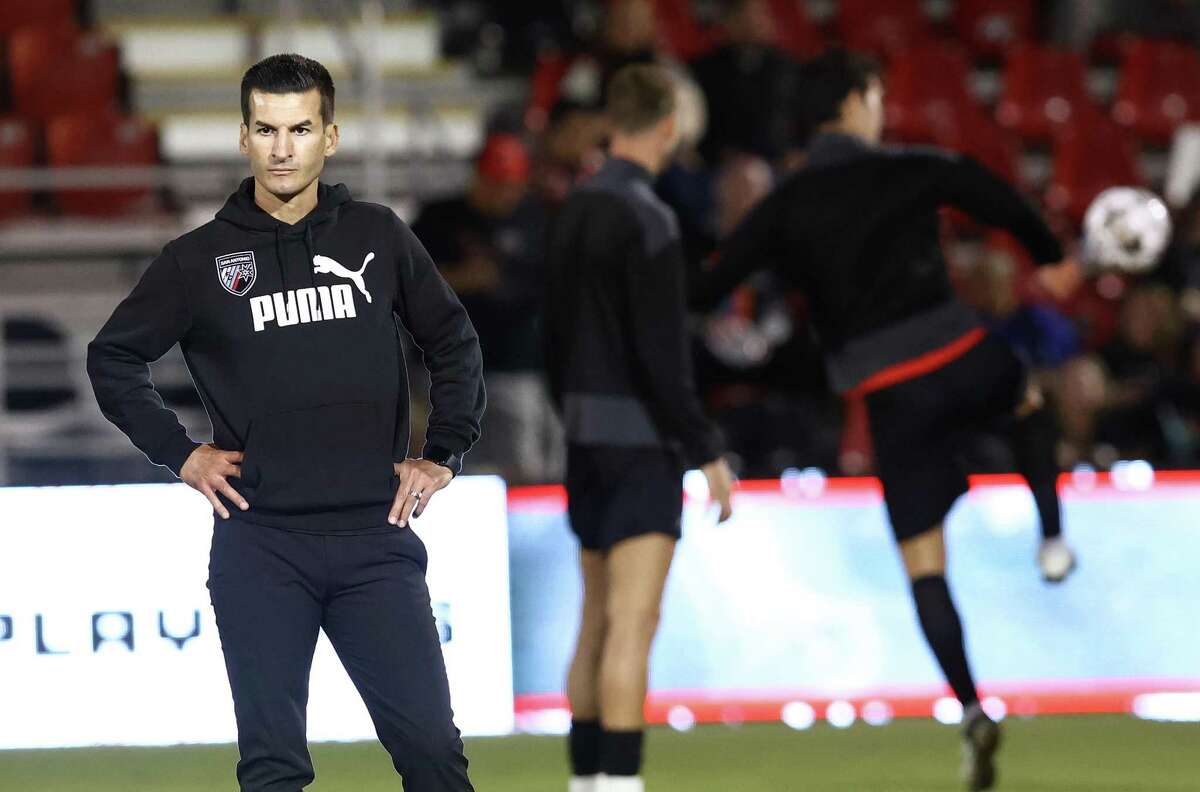 San Antonio FC head coach Alen Marcina watches his players warm up before the game against the Oakland Roots in the first round of the playoffs at Toyota Field on Friday, Oct. 28, 2022.