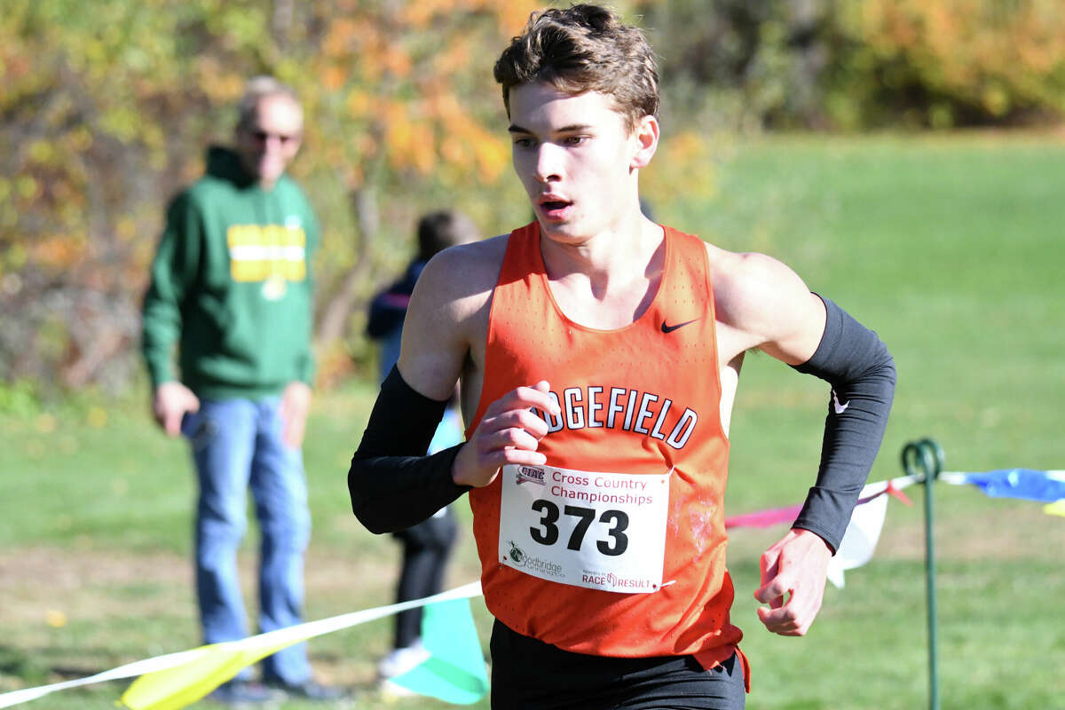 Ridgefield's Steven Hergenrother wins the Class LL boys cross country state title at Wickham Park, Manchester on Saturday, Oct. 29, 2022.