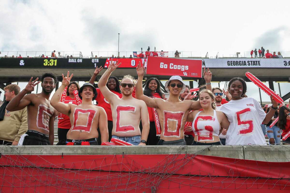 HOUSTON, TX OCT 29: Houston Cougars students show off their team spirit during the college football game between the South Florida Bulls and Houston Cougars at TDECU Stadium in Houston, Texas.