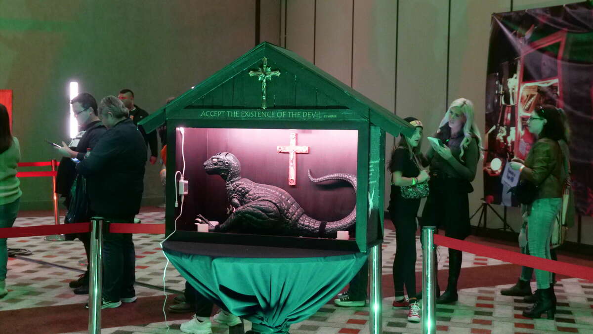 A dinosaur doll believed to be possessed as part of the "Devil made me do it" case from the Warren Occult Museum at the Warren's Seekers of the Supernatural Paracon at Mohegan Sun on Saturday, Oct. 29, 2022.