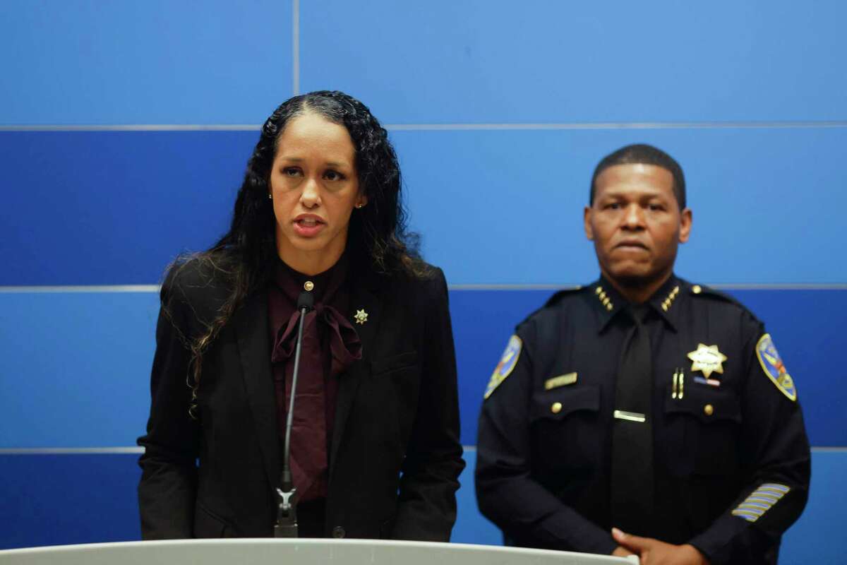 San Francisco District Attorney Brooke Jenkins speaks during a press conference in San Francisco, Calif. as Police Chief Bill Scott looks on.