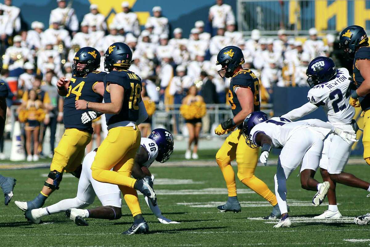 Max Duggan throws for 3 TDs as No. 7 TCU defeats West Virginia