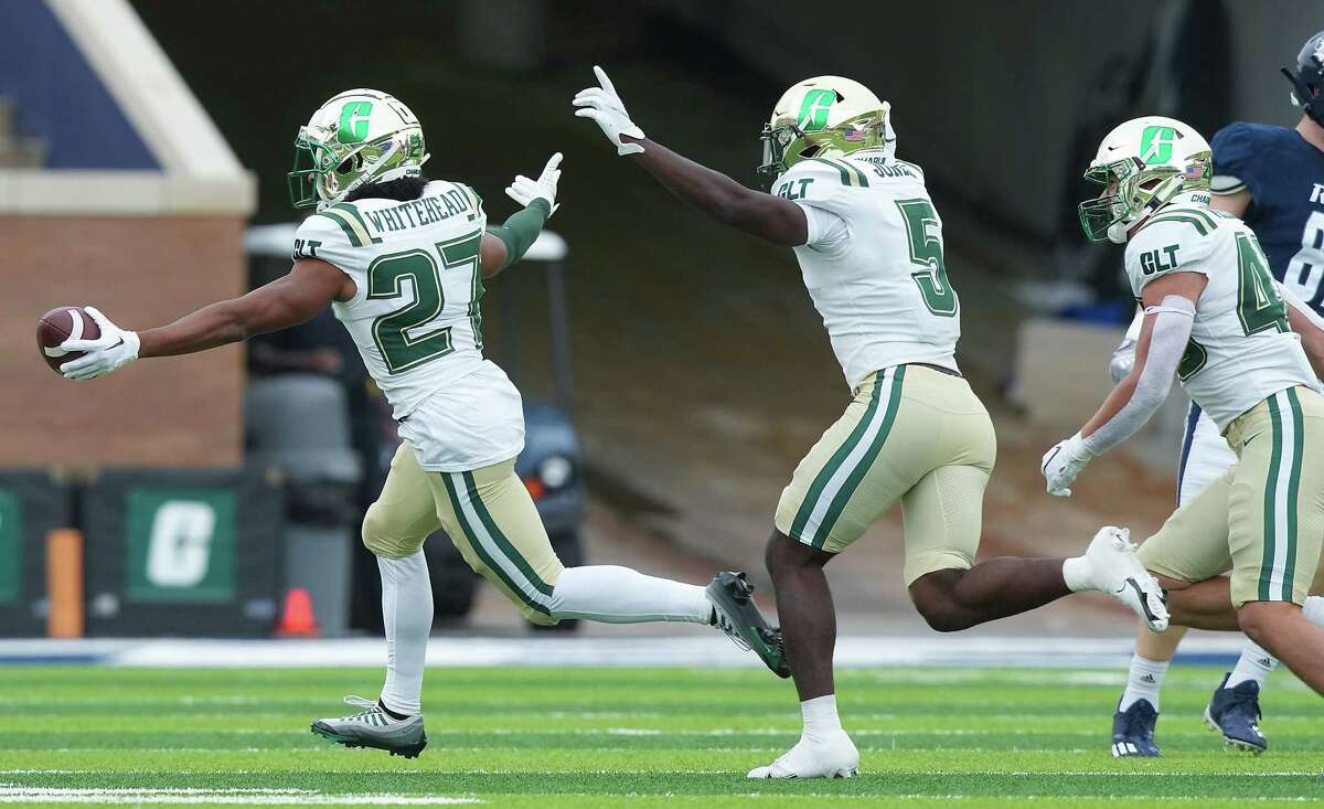 Charlotte 49ers defensive back Bryson Whitehead (27) celebrates his interception in the first half of game action against Rice University at Rice Stadium on Saturday, Oct. 29, 2022 in Houston.