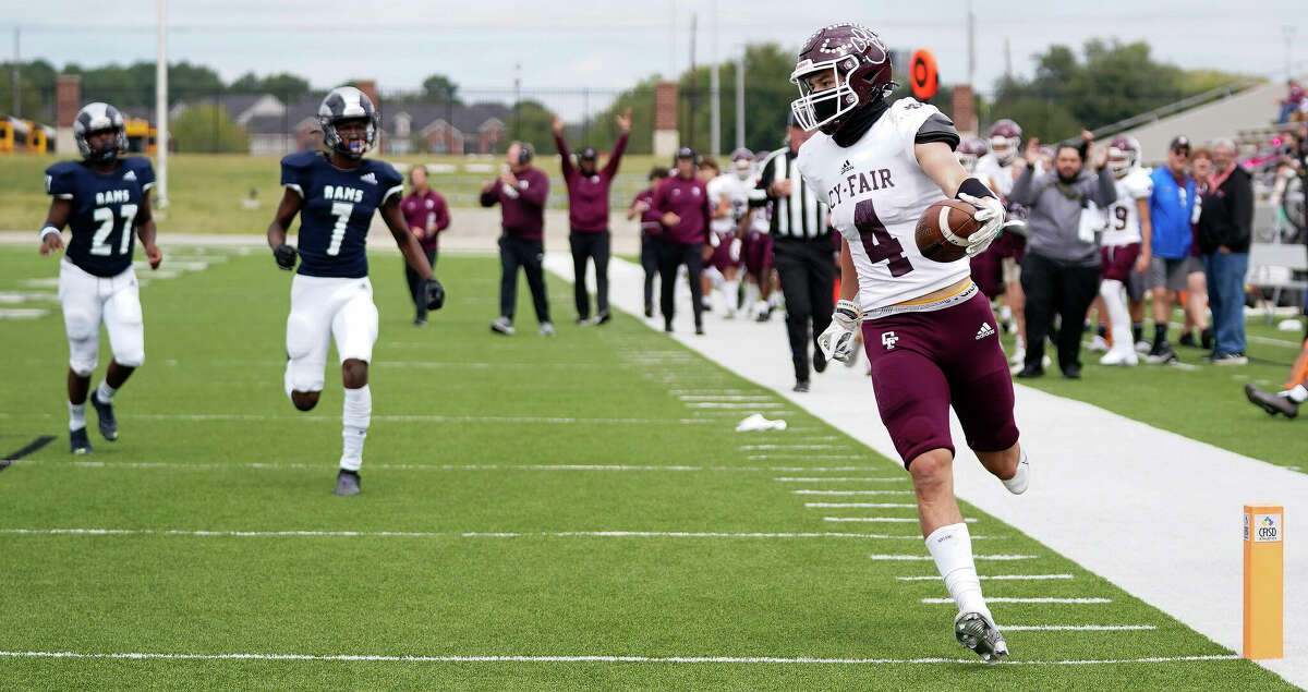 Cy-Fair wide receiver Owen Carter (4) runs into the end zone for a touchdown during the first half of a high school football game against Cy-Ridge, Saturday, Oct. 29, 2022, in Houston.