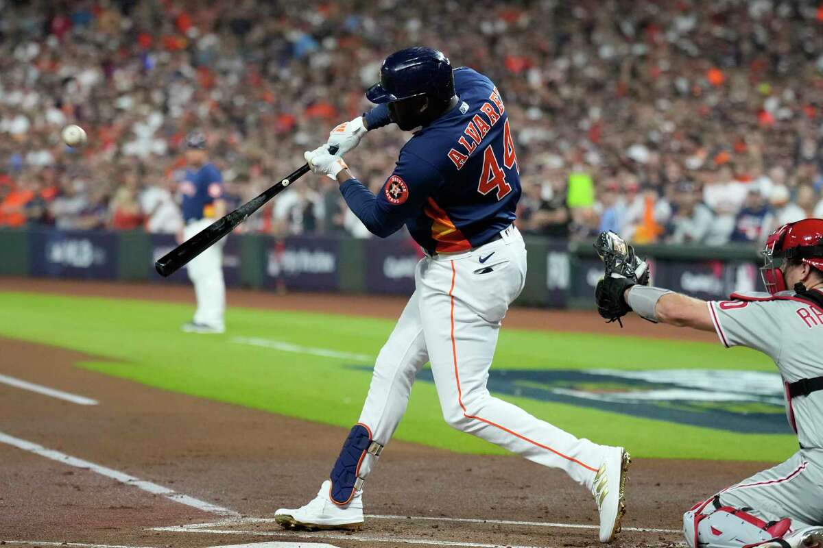 Houston Astros designated hitter Yordan Alvarez (44) hits an RBI double off Philadelphia Phillies starting pitcher Zack Wheeler to take a 2-0 lead in the first inning during Game 2 of the World Series at Minute Maid Park on Saturday, Oct. 29, 2022, in Houston.