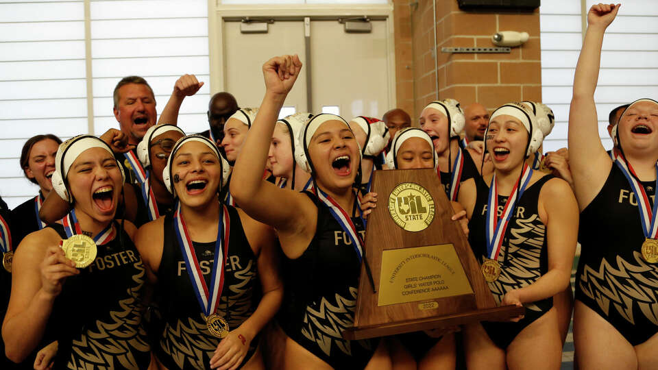 Richmond Foster celebrate their victory In girls 6A finals Richmond Foster v Clute Brazoswood on Saturday, Oct. 29, 2022 at Josh Davis Natatorium.